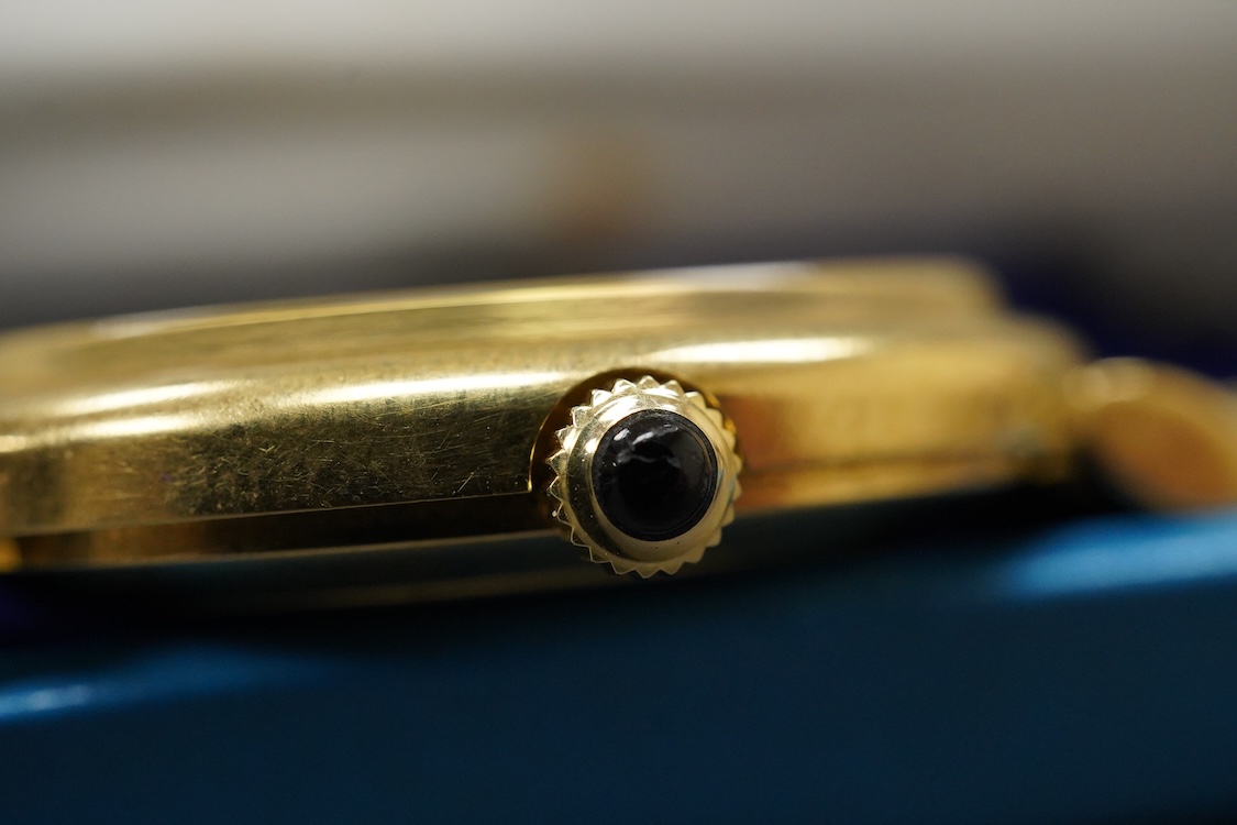 A gentleman's 18ct Girard-Perregaux manual wristwatch, oval brushed gilt dial with raised hour baton marks, seventeen jewels movement, signed, on an associated gilt metal articulated bracelet, in original case.